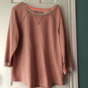 Orange and grey striped sweater